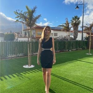 Aqua Bloomingdale’s Black shift Dress with Rhinestone cutouts